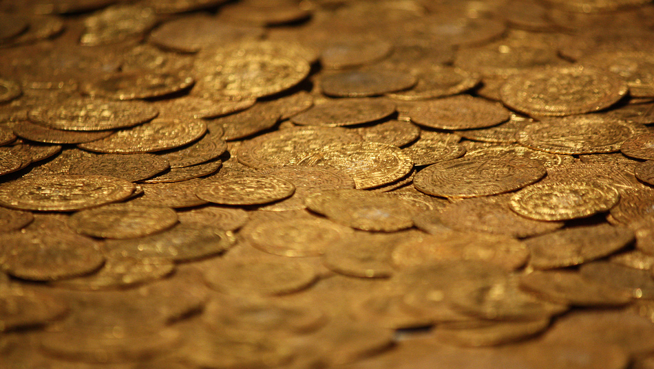Вложения в золото: как инвестировать и стоит ли?